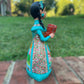Hand painted Maria doll left side