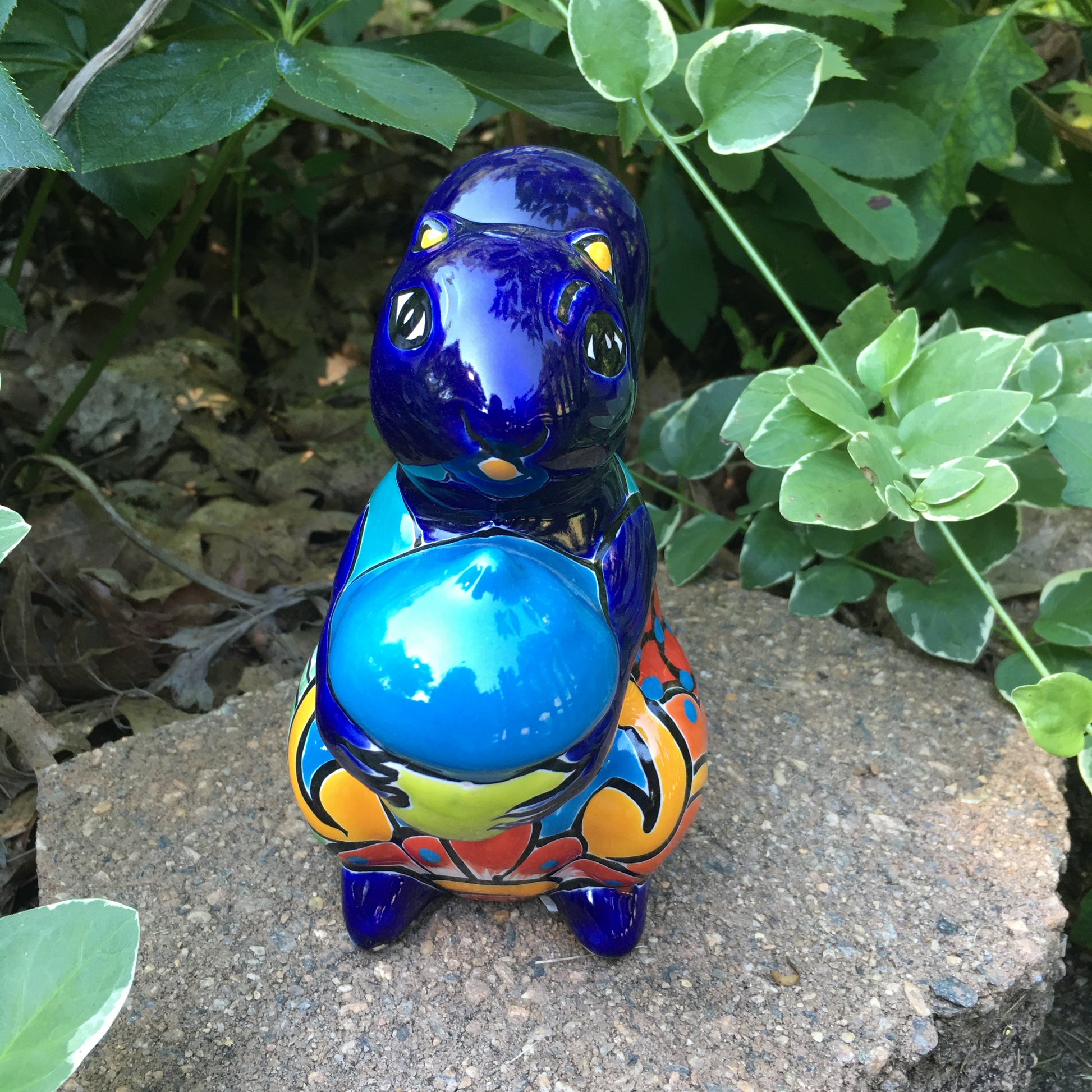 Talavera squirrel holding nut front