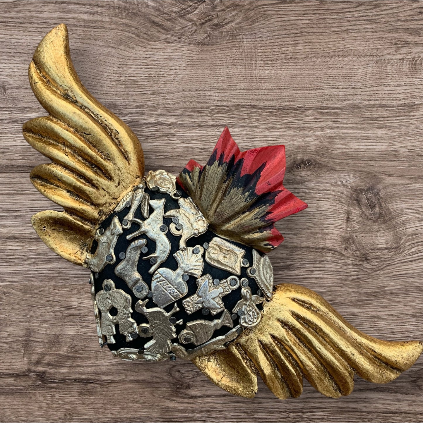 Winged milagors sacred heart