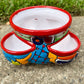 Hand painted Mexican Talavera Strawberry pot with a large top opening a four pockets on each side.  Trim color is cherry red, body has multi-color designs on each side. This is the side view.