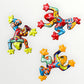 Three colorful ceramic frogs on a white background