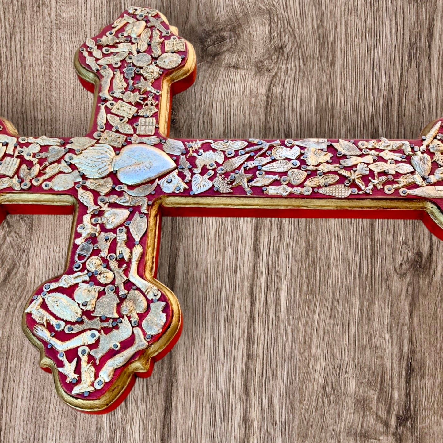 Milagros decorated wood cross left side view