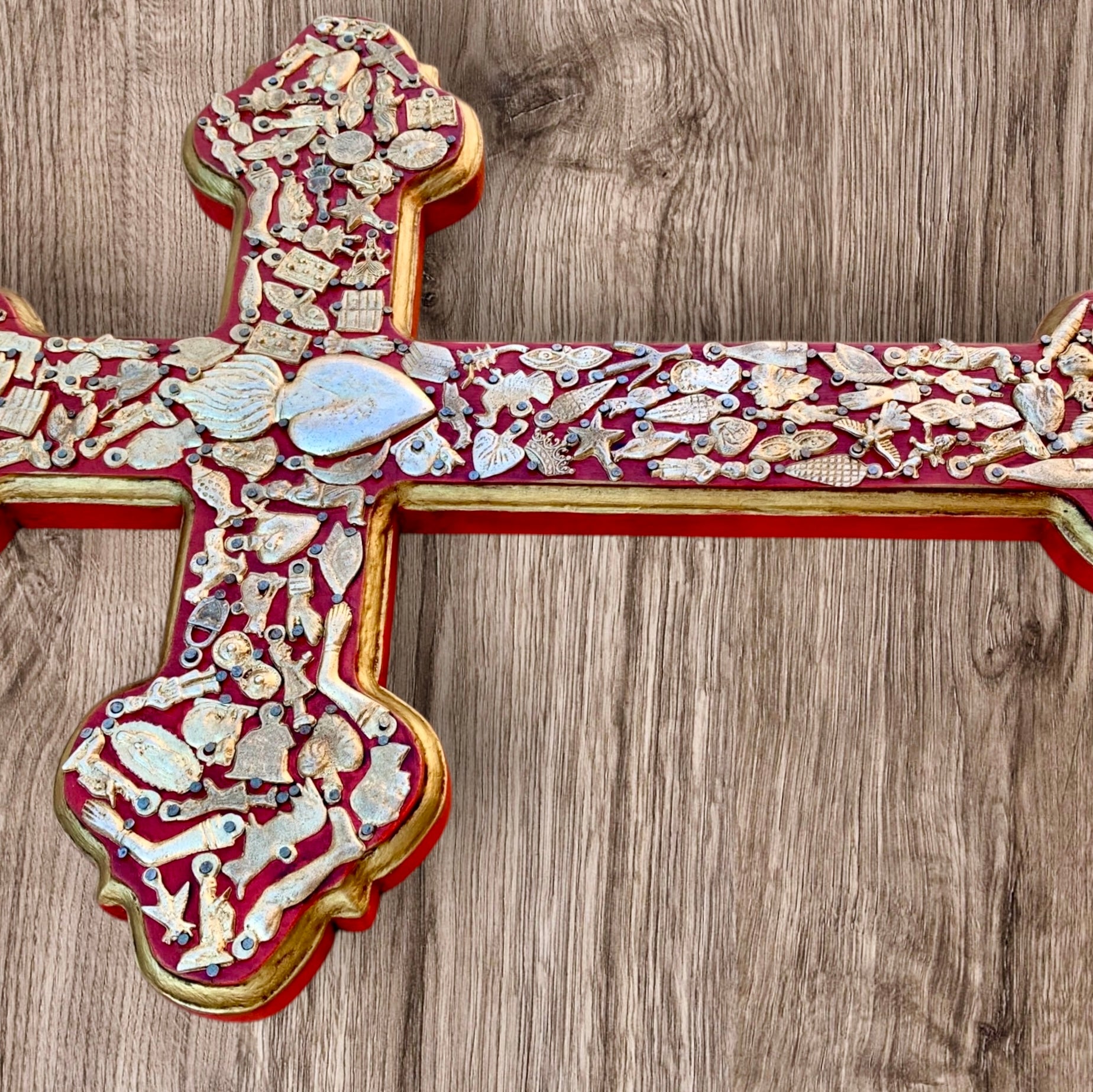 Milagros decorated wood cross left side view