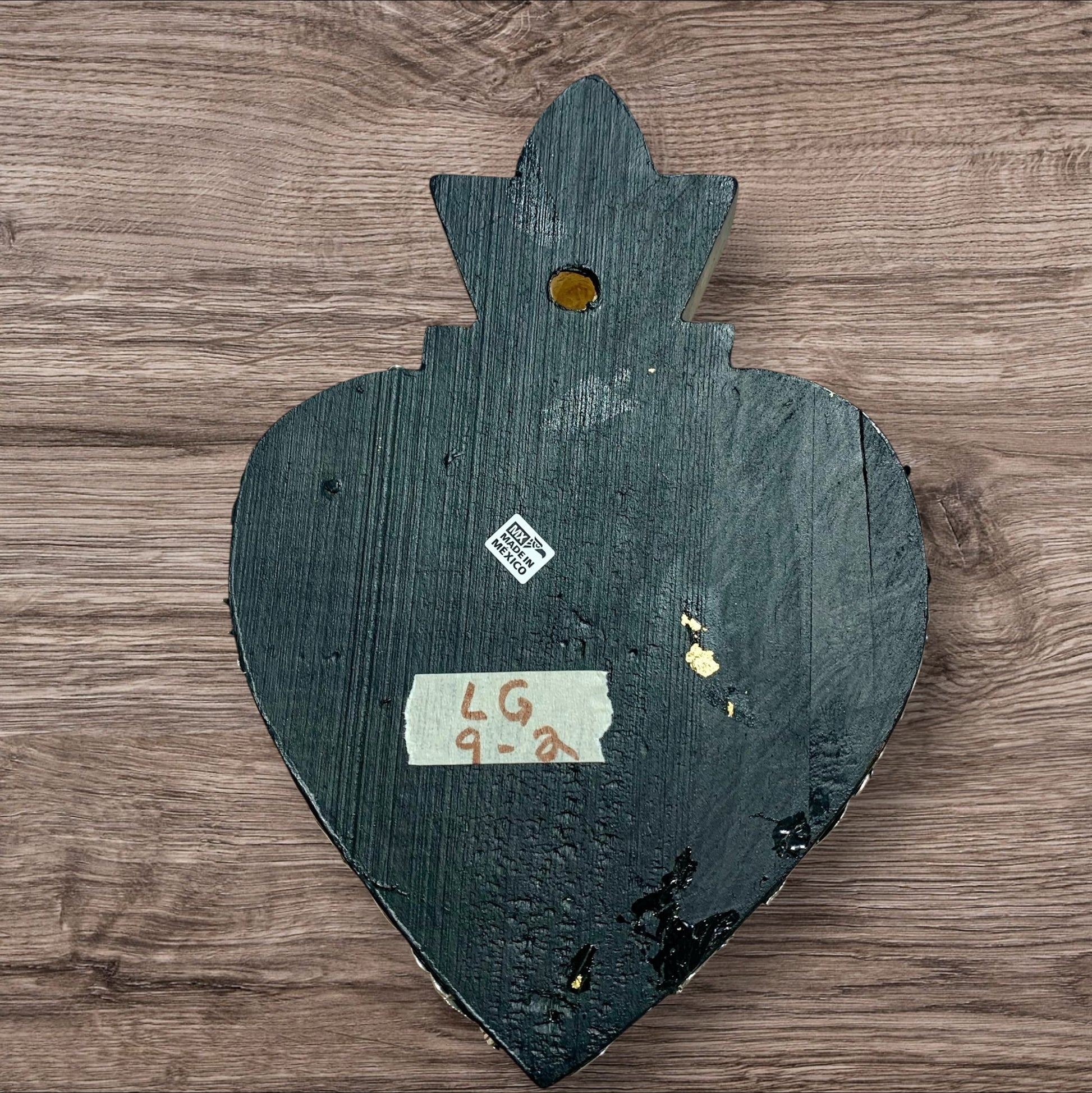 Milagro’s heart grande back
