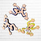 Back view of Mexican Talavera wall frog set showing hanging holes.