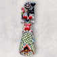 Talavera Frida doll holding parrot and monkey back view