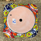 Hand painted Mexican Talavera Strawberry pot with a large top opening a four pockets on each side.  Trim color is bright red, body has multi-color designs. Photos showing bottom with drain hole.