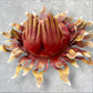 Metal wall art sun with hands bottom of hands
