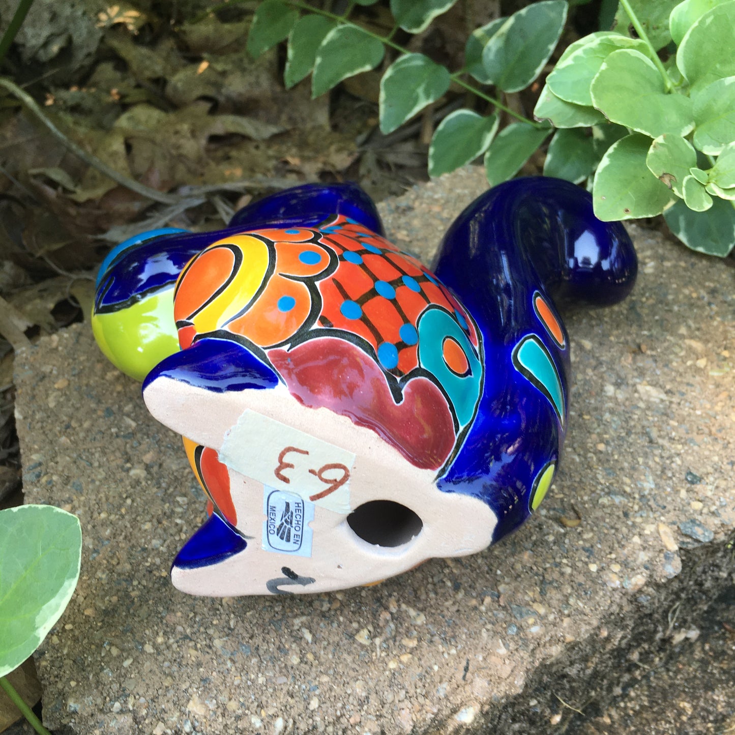 Talavera squirrel holding nut bottom