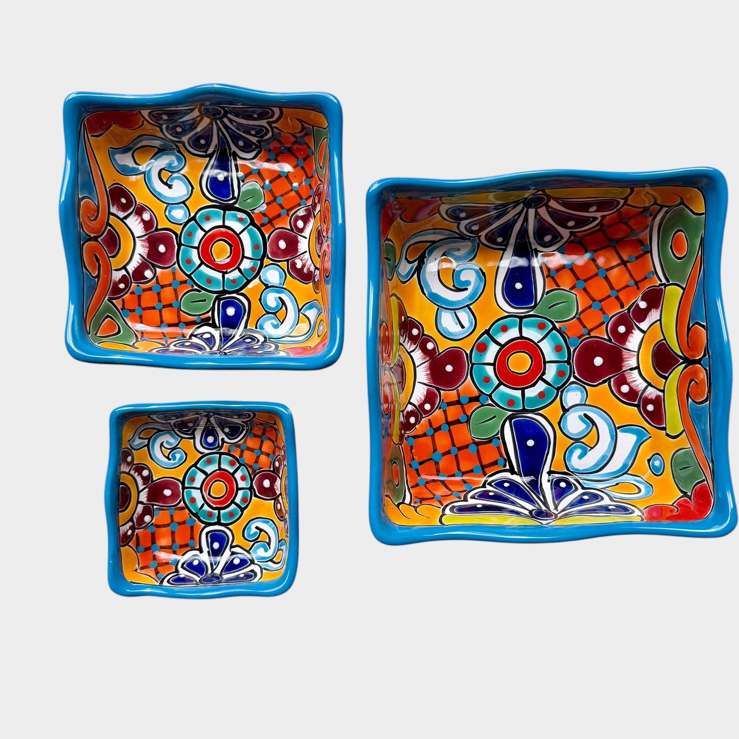 Three colorful talavera square nesting bowls with intricate patterns Unnested