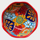 Three colorful talavera nesting bowls with intricate patterns Large bowl