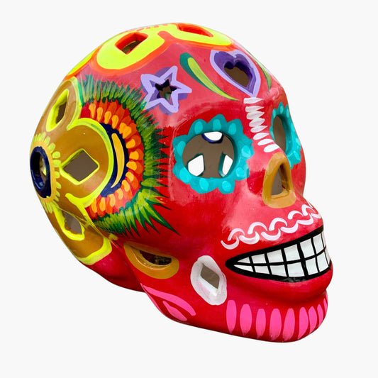 Colorful Mexican Sugar skull with vibrant designs on a white background