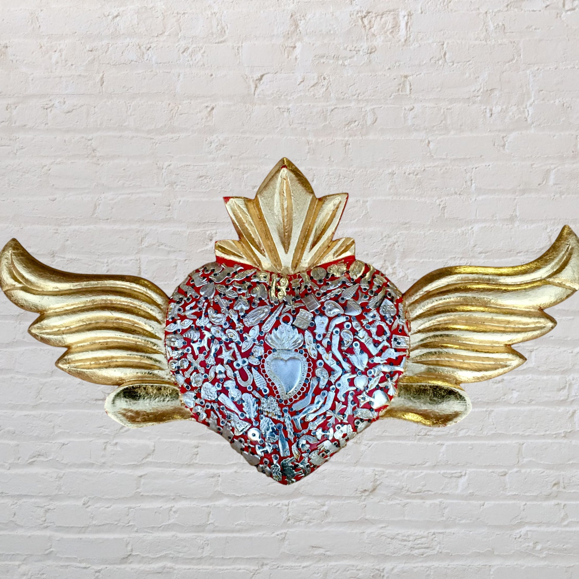 Milagros winged heart front 