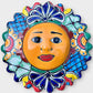 Decorative talavera wall Sun with a colorful face design on a white background