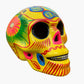 Colorful Mexican Sugar skull yellow with vibrant designs on a white background