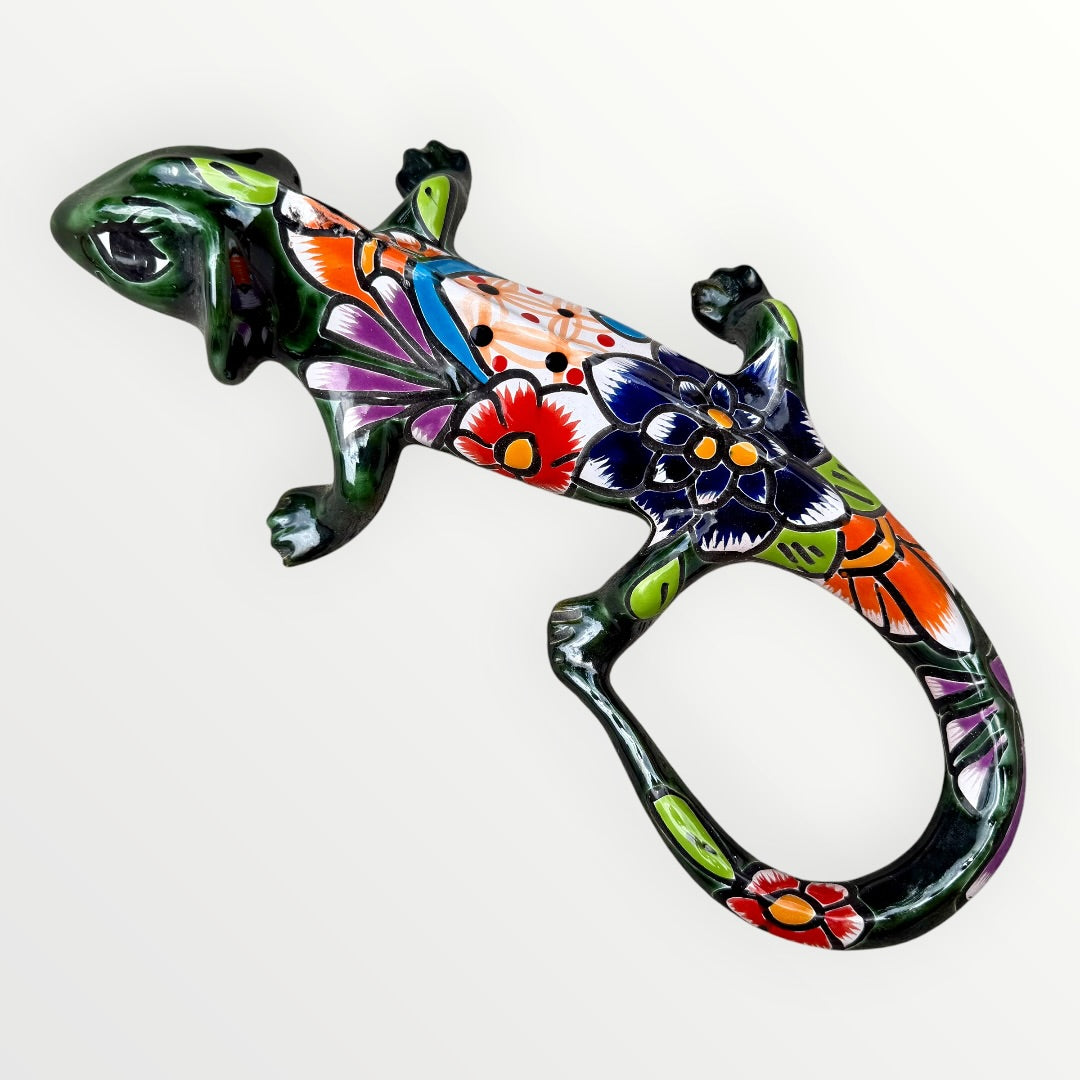 Mexican Talavera wall mounted iguana in dark green with multicolor designs.