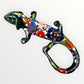 Mexican Talavera wall mounted iguana in dark green with multicolor designs.