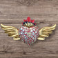 Milagros decorated sacred heart with wings front