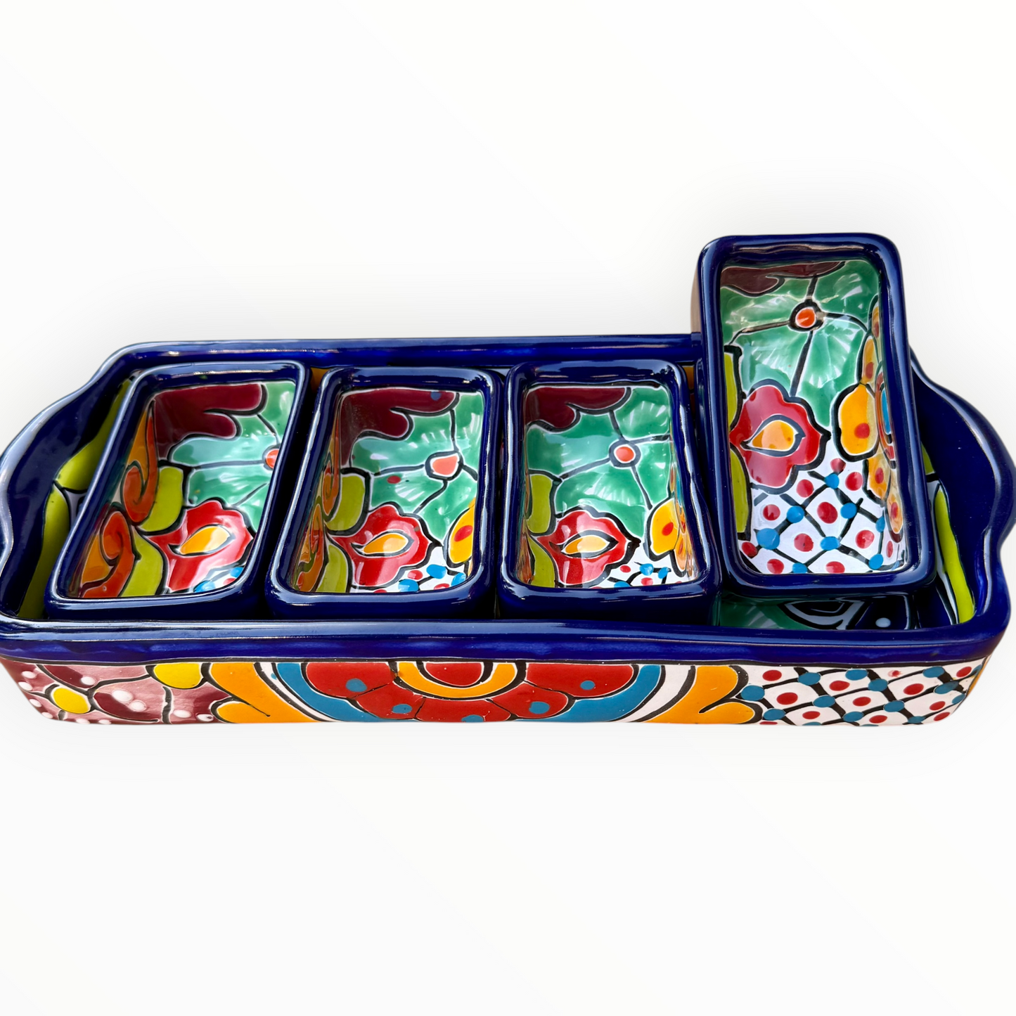 A sectional, rectangle Talavera hand-painted serving fish with a deep rectangular dish and four shallow rectangular sections, decorated with vibrant floral and geometric patterns in blue, red, green, yellow, and orange on a white background.