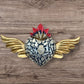Milagros decorated sacred heart with wings front