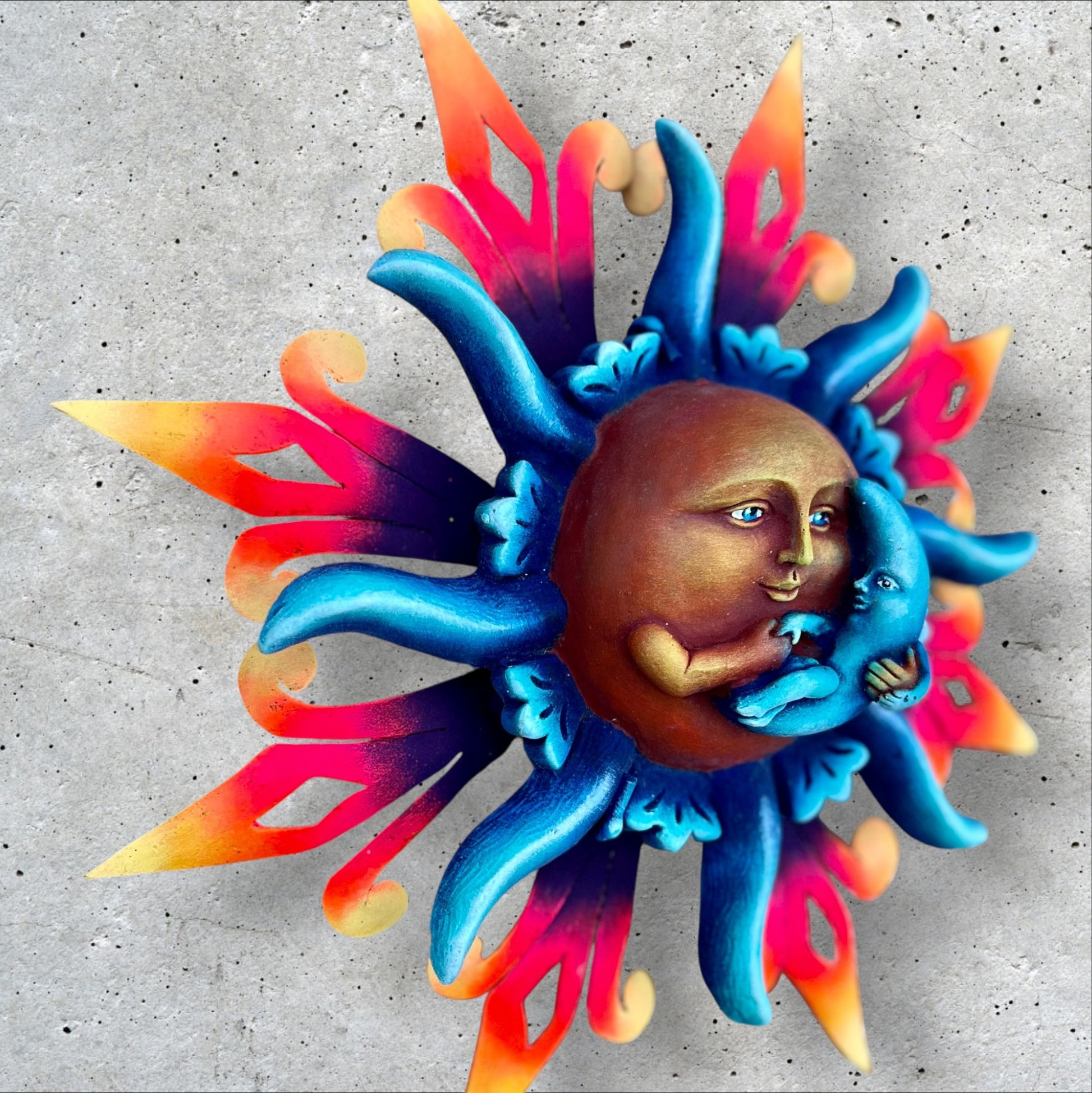 Peaceful sun holding moon left side