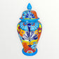 Colorful Mexican Talavera ceramic jar with lid decorated with intricate multicolor traditional patterns 