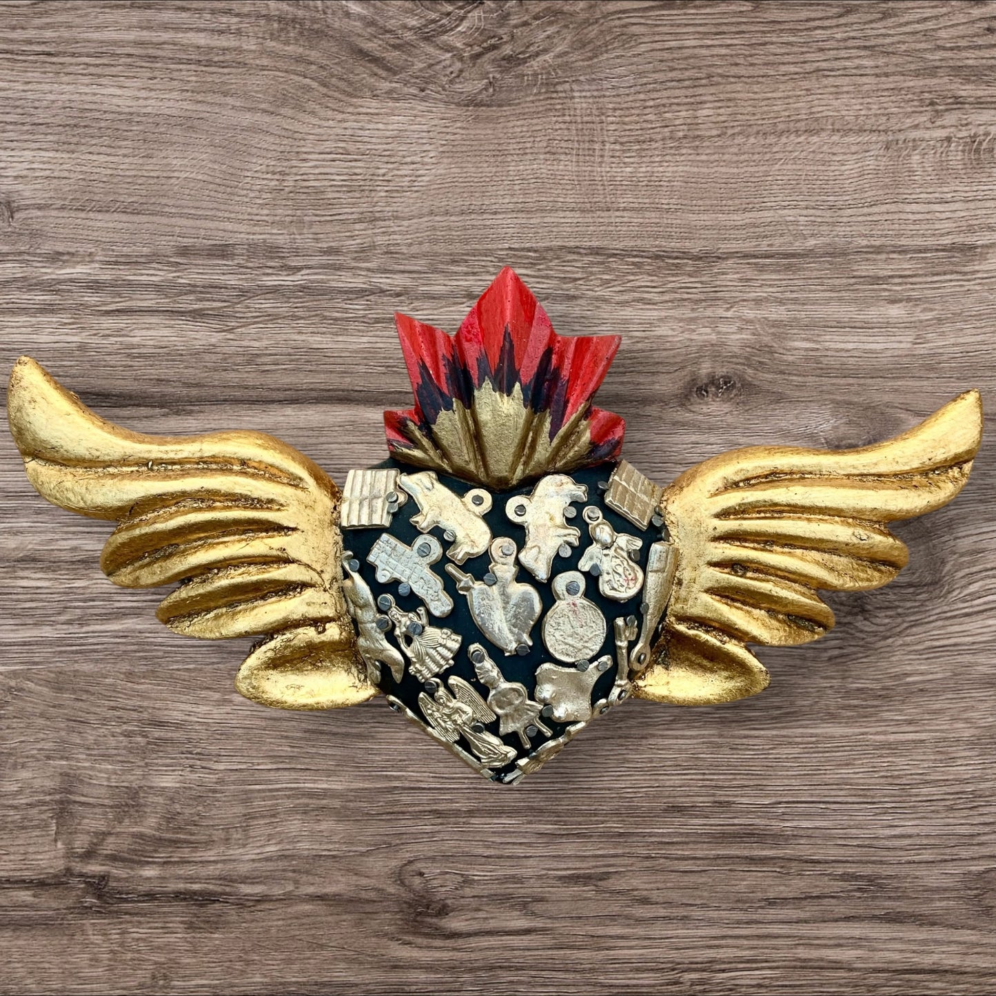 Milagros decorated flying sacred heart front