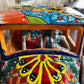 mexican talavera pick up truck with catrina skeltons figurines