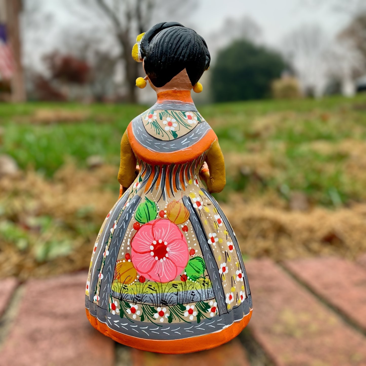 Hand painted Maria doll Chico back