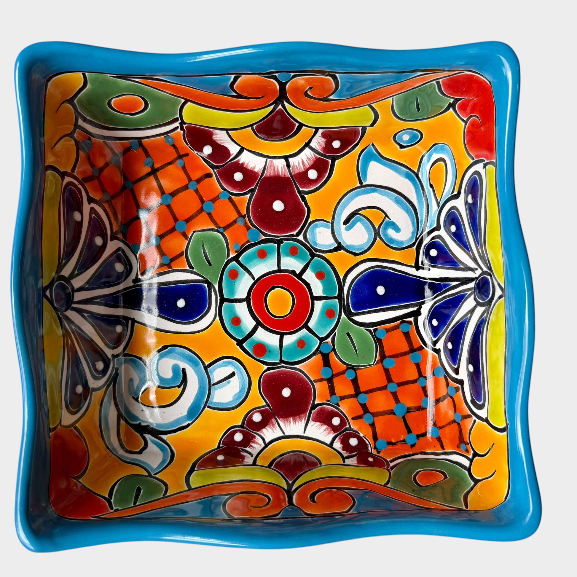 Three colorful talavera square nesting bowls with intricate patterns Large