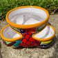 Hand painted Mexican Talavera Strawberry pot with a large top opening a four pockets on each side.  Trim color is bright happy yellow, body has multi-color designs on each of the four sides. Photo of the other side.