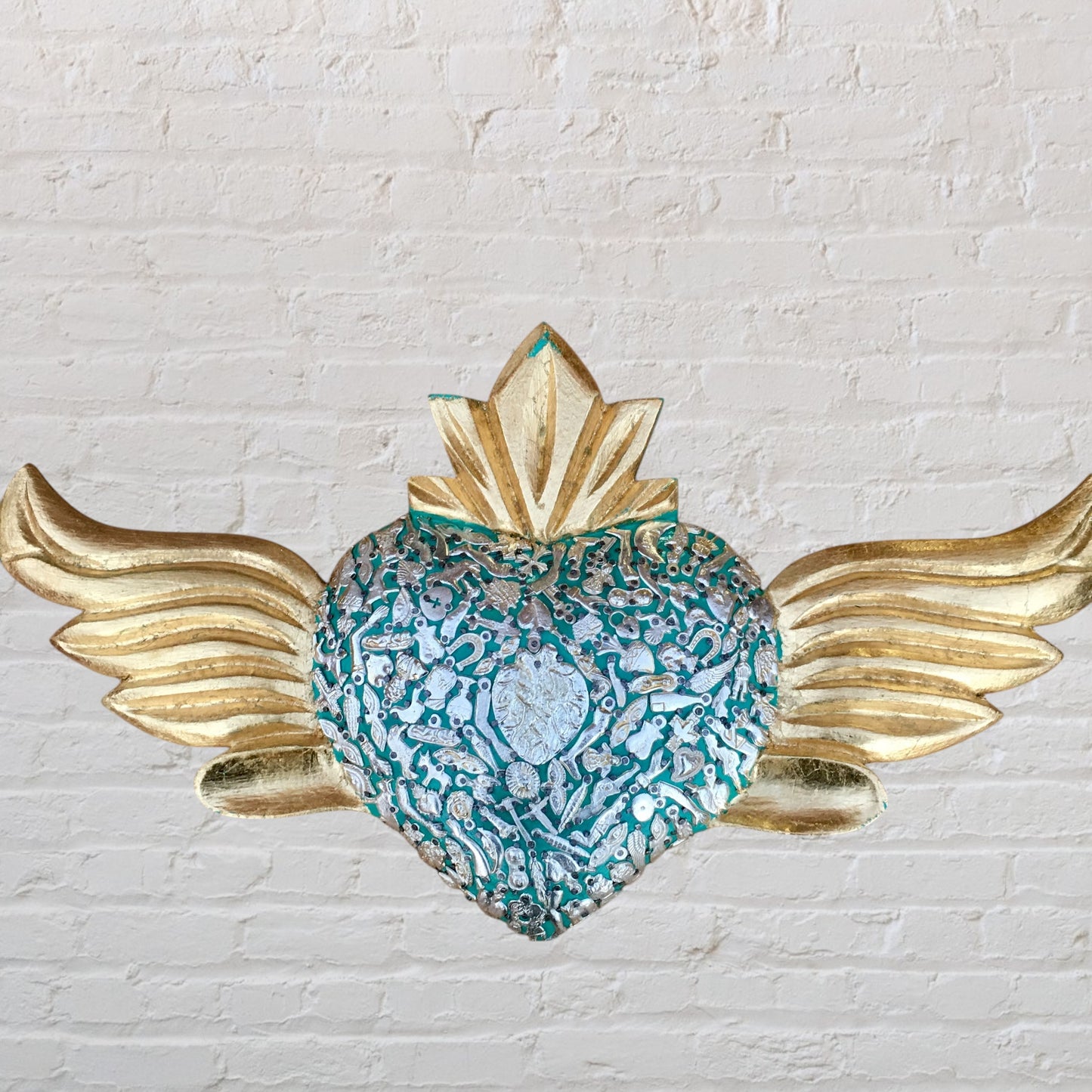 Milagros winged heart front