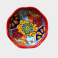 Three colorful talavera nesting bowls with intricate patterns Medium bowl
