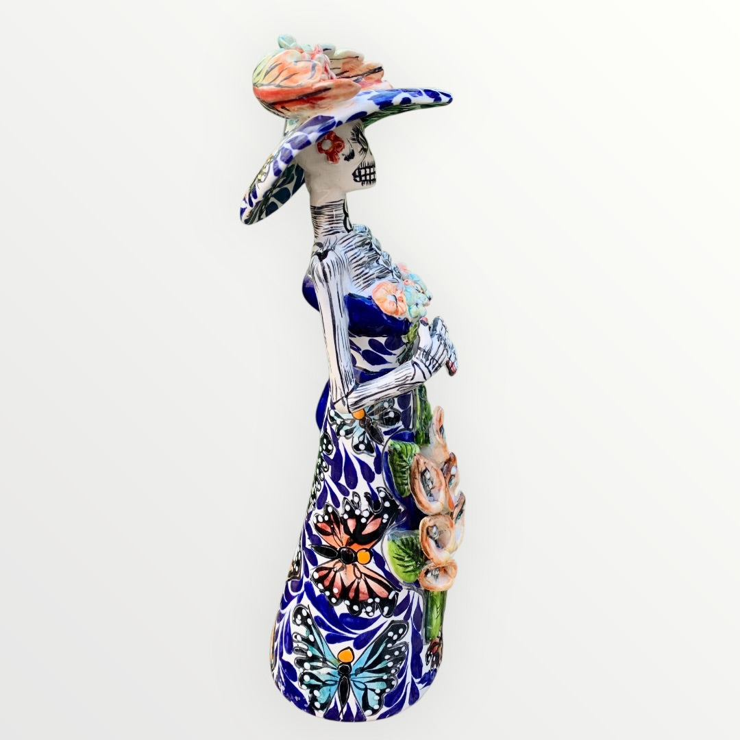 Mexican Talavera Catrina skeleton doll with Calla lilies and butterflies Left side