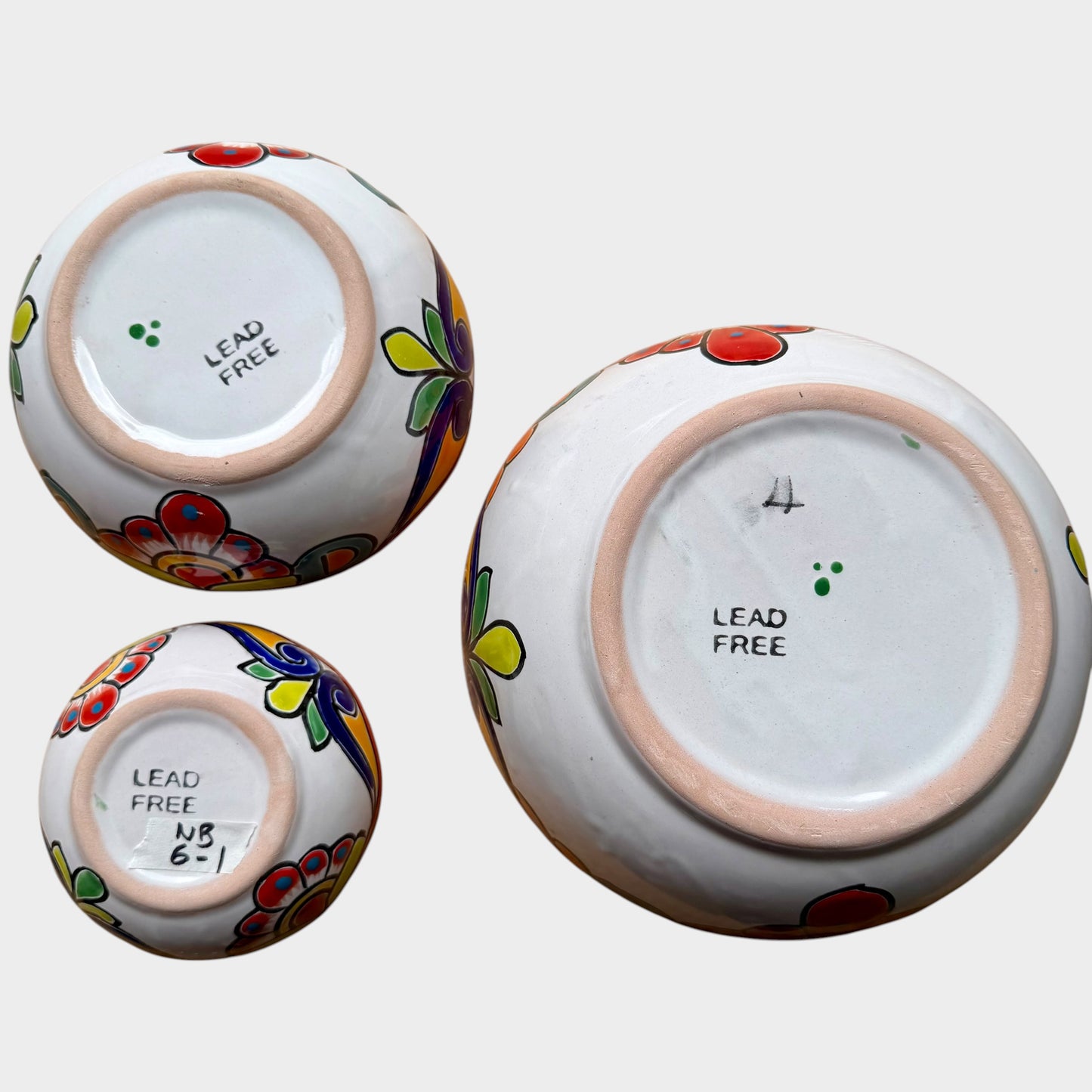 Three colorful talavera nesting bowls with intricate patterns Bottom
