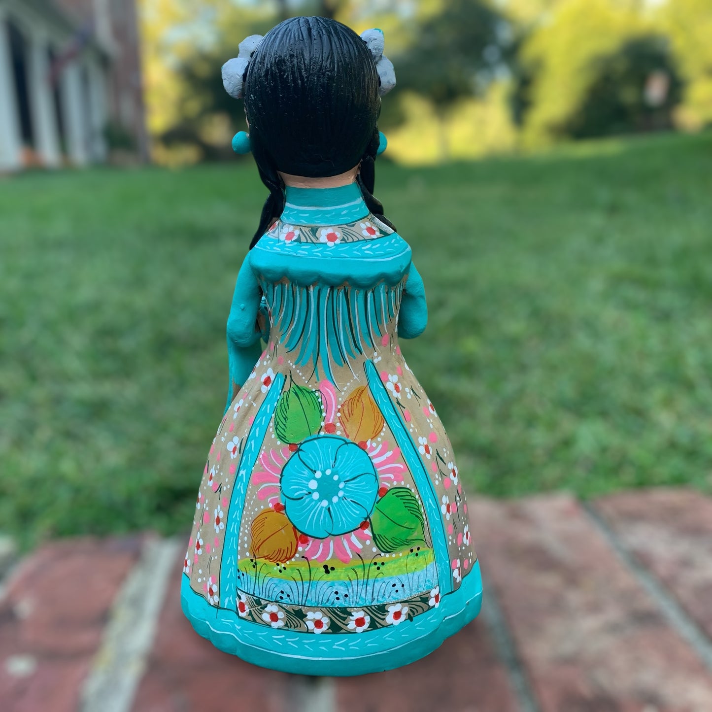 Hand painted Maria doll back