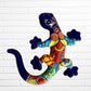 Colorful lizard-shaped wall art against a white brick wall background