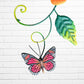 Decorative metal butterfly with pink wings on a white brick wall background bottom butterfly