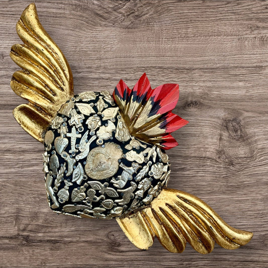 Milagros decorated sacred heart with wings