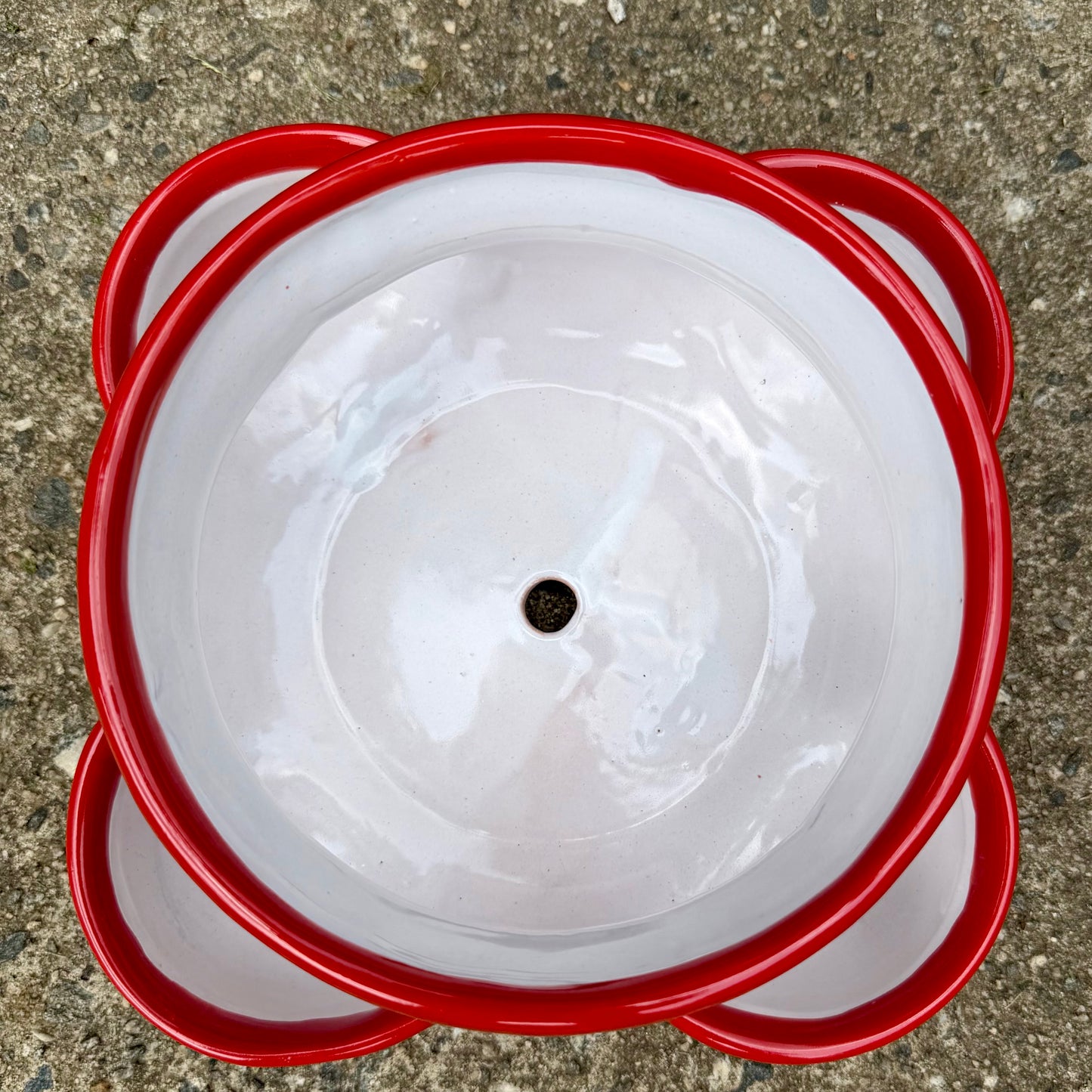 Hand painted Mexican Talavera Strawberry pot with a large top opening a four pockets on each side.  Trim color is cherry red, body has multi-color designs on each side. Photo shows top opening.