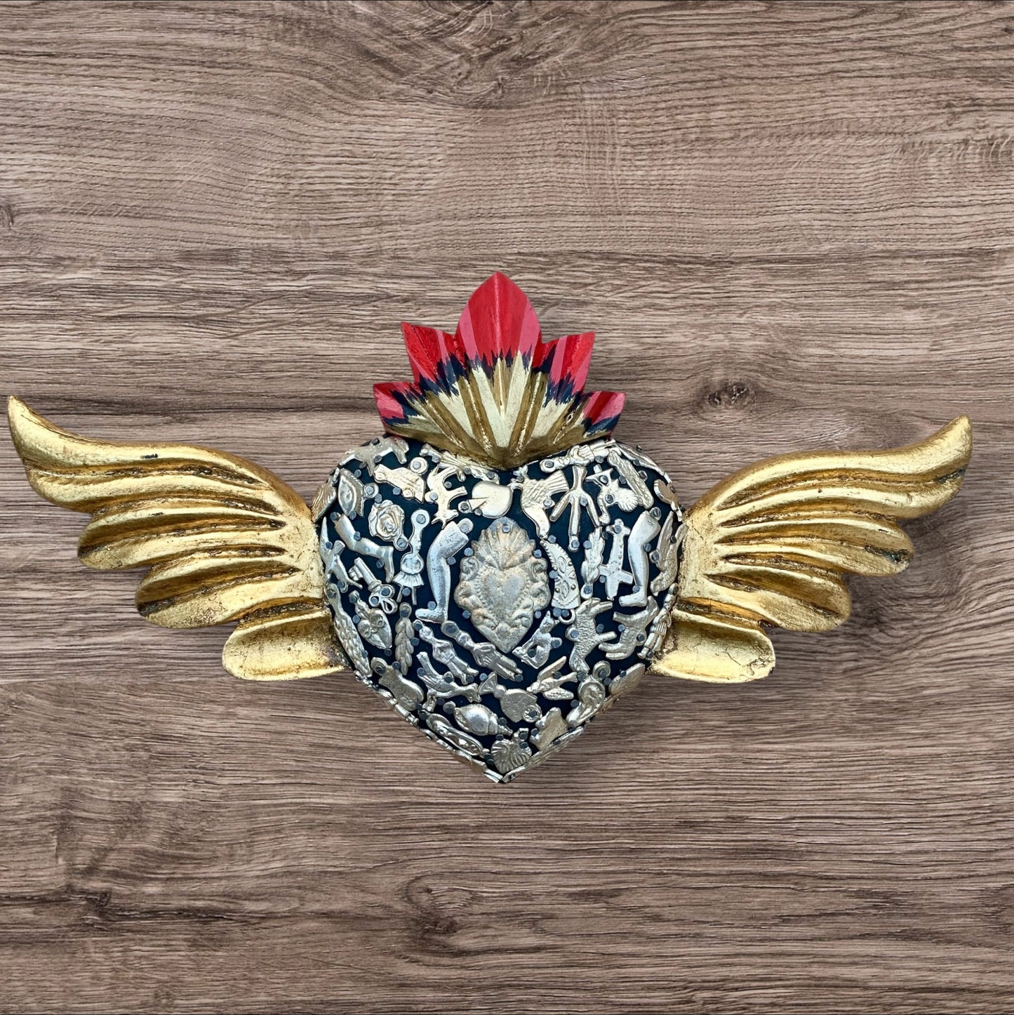 Milagros decorated sacred heart with wings front