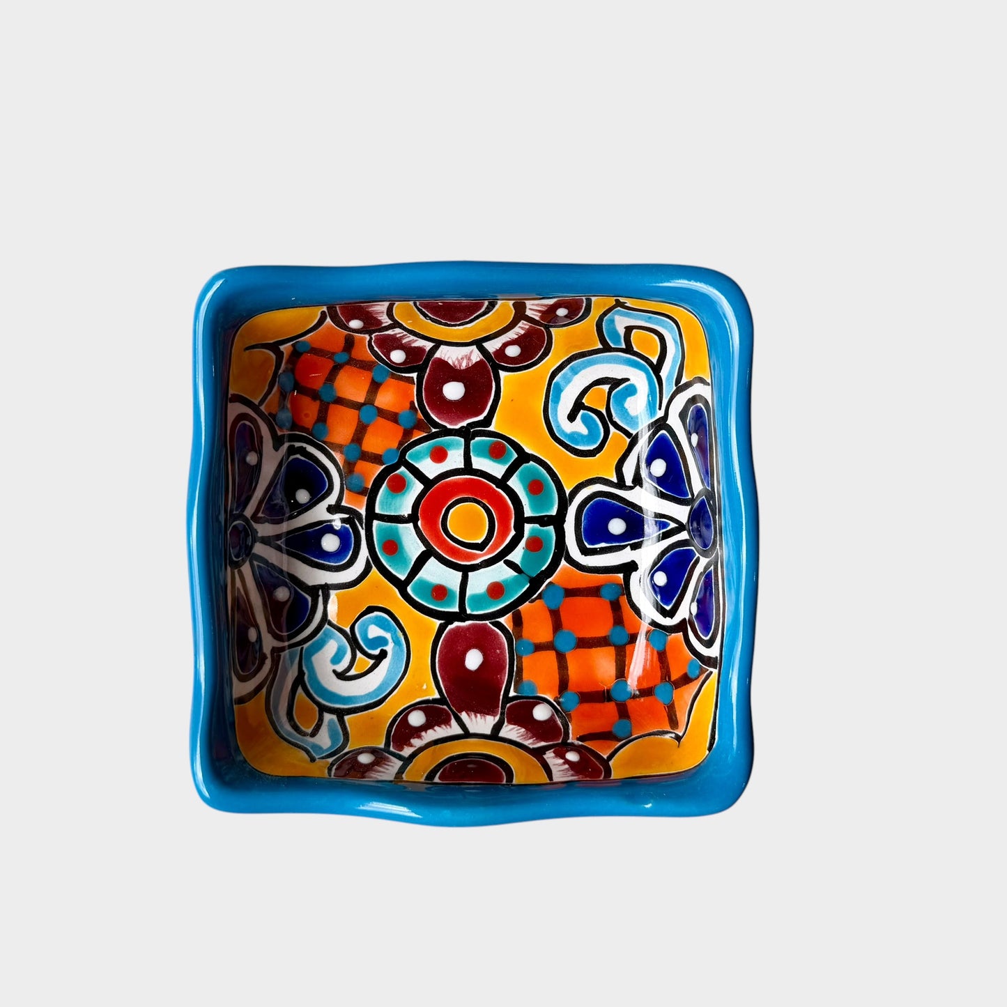 Three colorful talavera square nesting bowls with intricate patterns Small