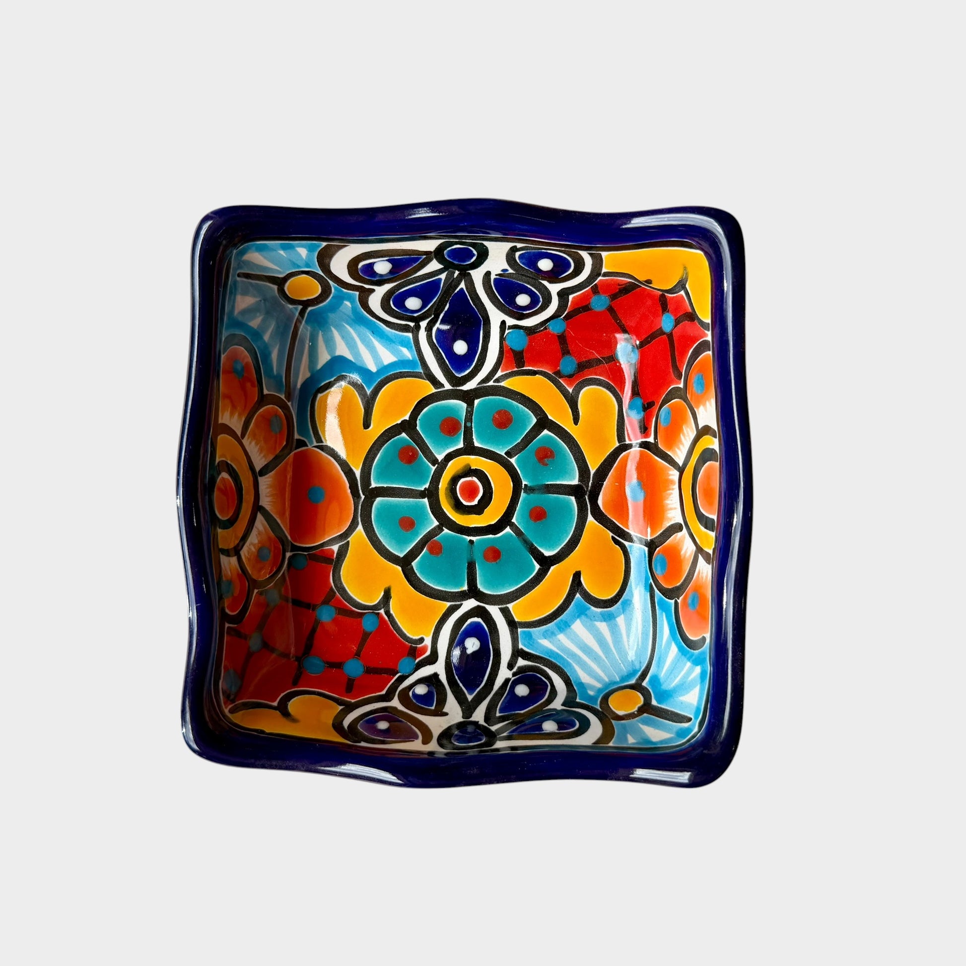 Three colorful talavera square nesting bowls with intricate patterns Small bowl