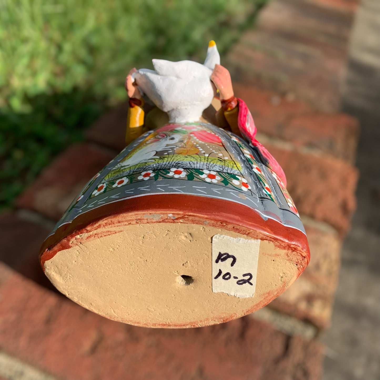 Hand painted Maria doll bottom