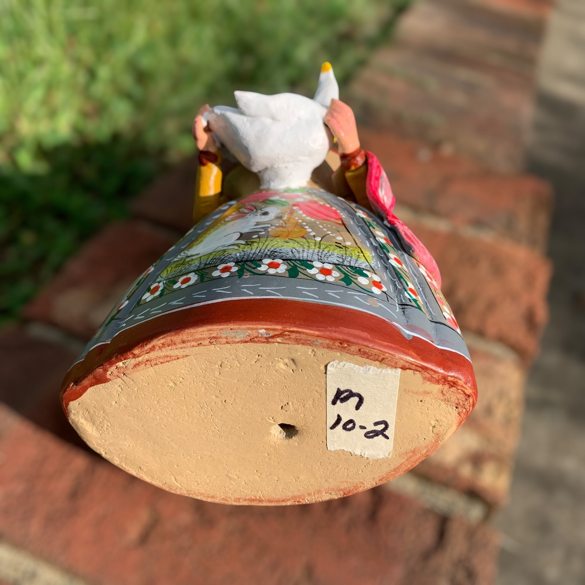 Hand painted Maria doll bottom