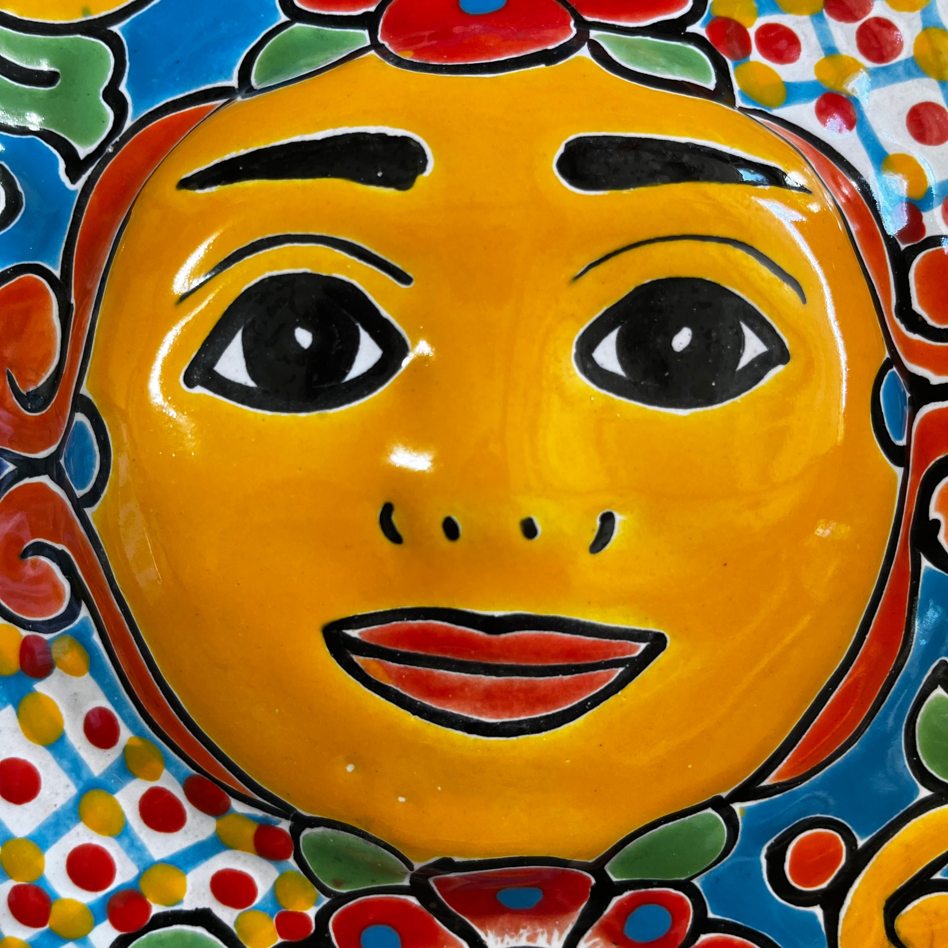 Mexican Talavera Sun face close up