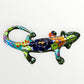 Mexican Talavera wall mounted iguana in dark green with multicolor designs left side
