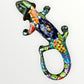 Mexican Talavera wall mounted iguana in dark green with multicolor designs.