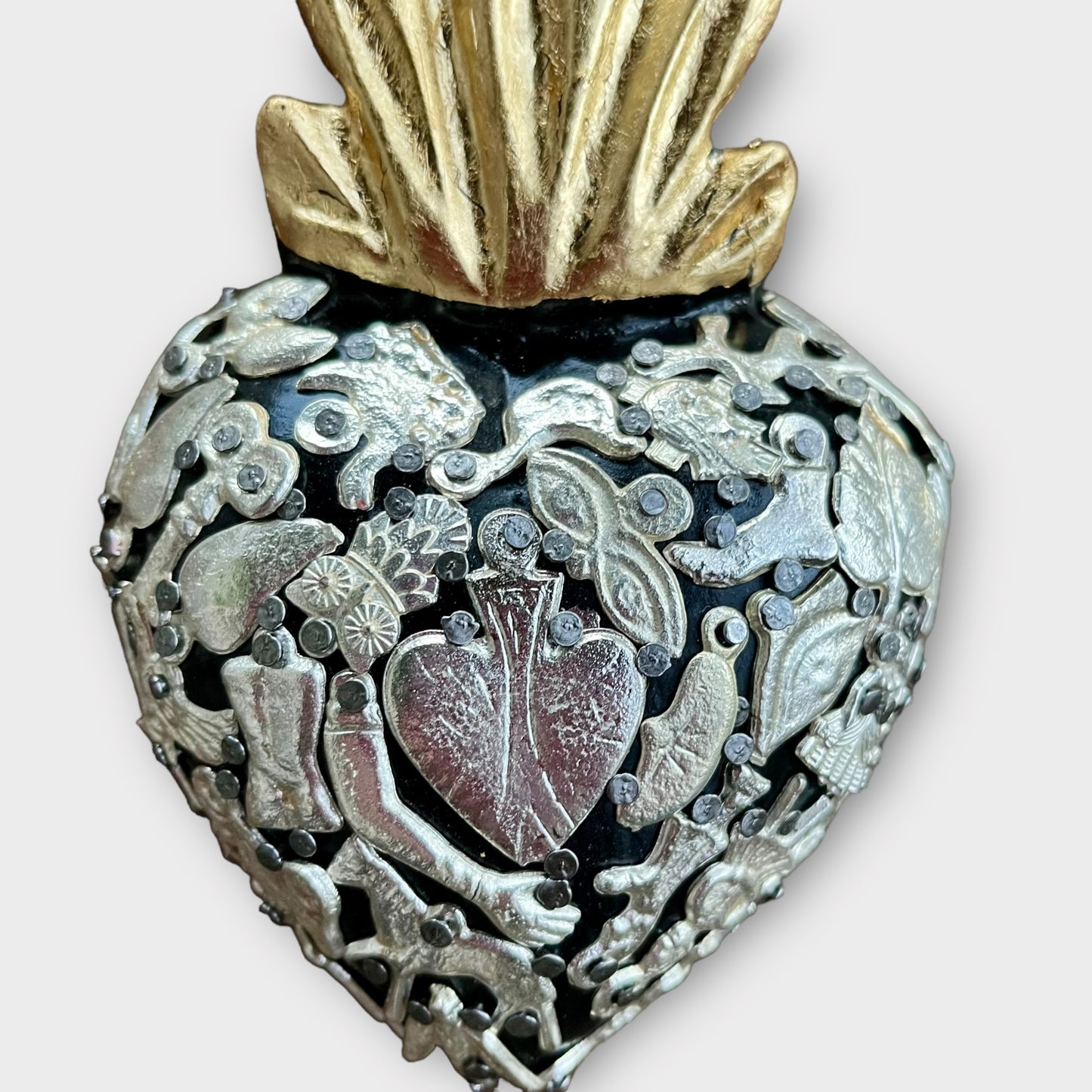 Mexican Milagros charms wood heart corazon close up