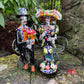 Mexican talavera catrina man and women on bench